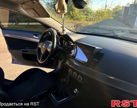 Синій Міцубісі Lancer, об'ємом двигуна 2 л та пробігом 250 тис. км за 6999 $, фото 1 на Automoto.ua