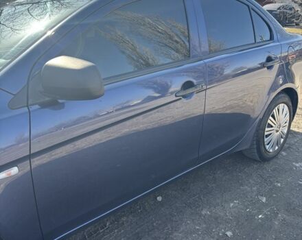 Синий Мицубиси Лансер, объемом двигателя 1.5 л и пробегом 193 тыс. км за 5000 $, фото 1 на Automoto.ua