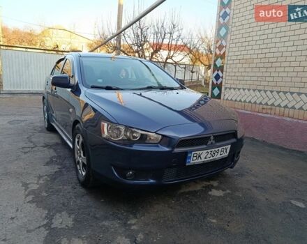 Синий Мицубиси Лансер, объемом двигателя 1.5 л и пробегом 210 тыс. км за 5100 $, фото 1 на Automoto.ua