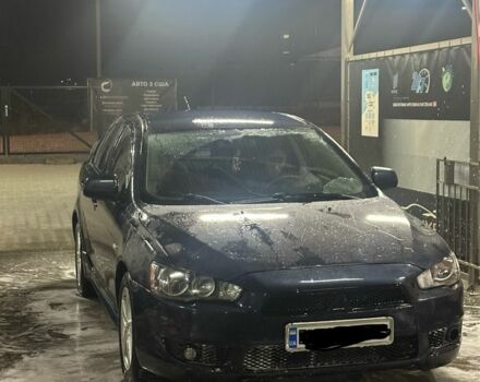 Синий Мицубиси Лансер, объемом двигателя 2 л и пробегом 318 тыс. км за 4500 $, фото 1 на Automoto.ua
