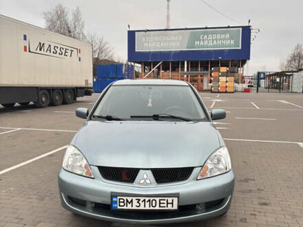 Синий Мицубиси Лансер, объемом двигателя 1.6 л и пробегом 238 тыс. км за 3500 $, фото 1 на Automoto.ua