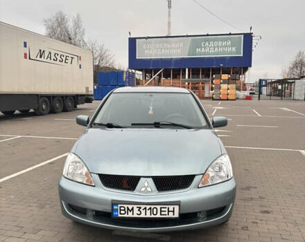 Синий Мицубиси Лансер, объемом двигателя 1.6 л и пробегом 238 тыс. км за 3500 $, фото 1 на Automoto.ua