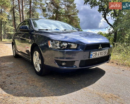 Синій Міцубісі Lancer, об'ємом двигуна 2 л та пробігом 312 тис. км за 5750 $, фото 1 на Automoto.ua