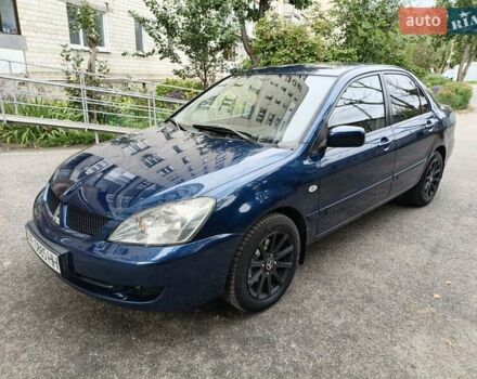 Синій Міцубісі Lancer, об'ємом двигуна 1.6 л та пробігом 228 тис. км за 3650 $, фото 1 на Automoto.ua