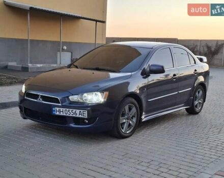 Синій Міцубісі Lancer, об'ємом двигуна 2 л та пробігом 234 тис. км за 6700 $, фото 1 на Automoto.ua