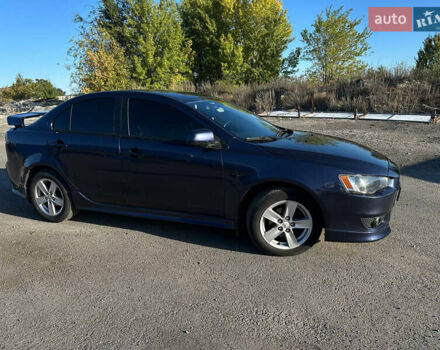 Синій Міцубісі Lancer, об'ємом двигуна 2 л та пробігом 240 тис. км за 6800 $, фото 1 на Automoto.ua
