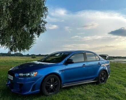 Синій Міцубісі Lancer, об'ємом двигуна 2 л та пробігом 229 тис. км за 6666 $, фото 1 на Automoto.ua