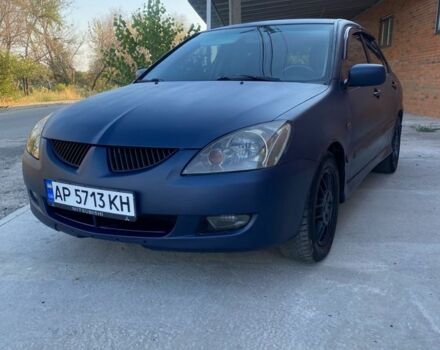 Синій Міцубісі Lancer, об'ємом двигуна 2 л та пробігом 1 тис. км за 4799 $, фото 1 на Automoto.ua