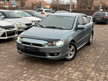 Синій Міцубісі Lancer, об'ємом двигуна 2 л та пробігом 201 тис. км за 6500 $, фото 1 на Automoto.ua