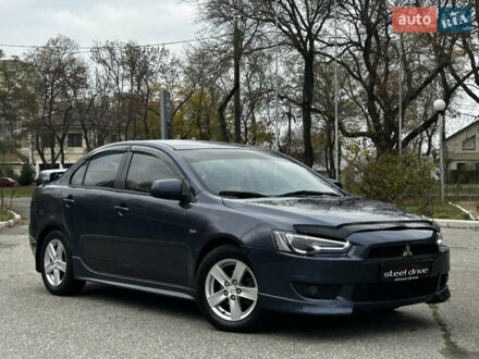 Синій Міцубісі Lancer, об'ємом двигуна 2 л та пробігом 222 тис. км за 5999 $, фото 1 на Automoto.ua