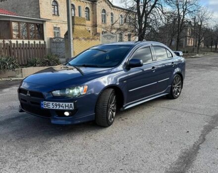 Синий Мицубиси Лансер, объемом двигателя 2 л и пробегом 200 тыс. км за 6500 $, фото 1 на Automoto.ua