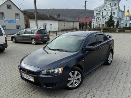 Синий Мицубиси Лансер, объемом двигателя 2 л и пробегом 324 тыс. км за 5999 $, фото 1 на Automoto.ua