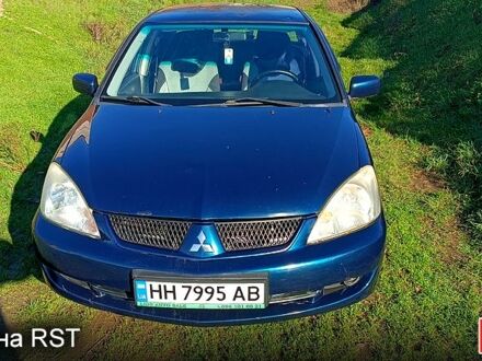 Синій Міцубісі Lancer, об'ємом двигуна 1.6 л та пробігом 285 тис. км за 3700 $, фото 1 на Automoto.ua