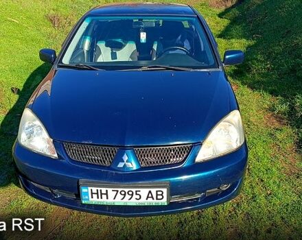 Синий Мицубиси Лансер, объемом двигателя 1.6 л и пробегом 285 тыс. км за 3700 $, фото 1 на Automoto.ua