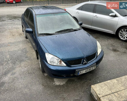 Синій Міцубісі Lancer, об'ємом двигуна 1.59 л та пробігом 200 тис. км за 3300 $, фото 1 на Automoto.ua