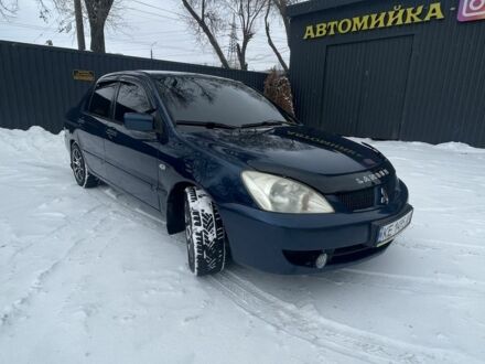 Синій Міцубісі Lancer, об'ємом двигуна 1.6 л та пробігом 319 тис. км за 3700 $, фото 1 на Automoto.ua