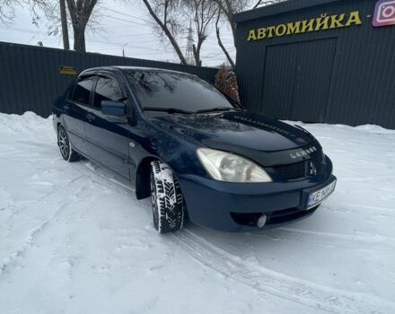 Синий Мицубиси Лансер, объемом двигателя 1.6 л и пробегом 319 тыс. км за 3700 $, фото 1 на Automoto.ua