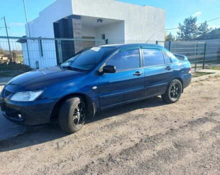 Синій Міцубісі Lancer, об'ємом двигуна 1 л та пробігом 111 тис. км за 3100 $, фото 1 на Automoto.ua