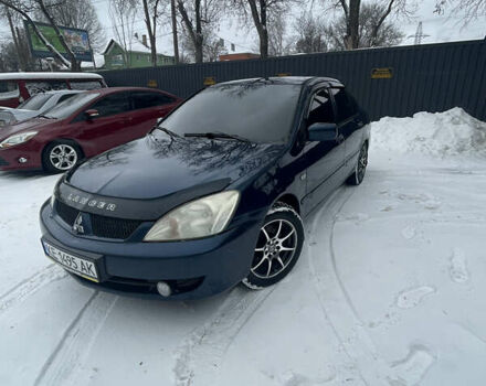 Синий Мицубиси Лансер, объемом двигателя 1.58 л и пробегом 319 тыс. км за 3700 $, фото 1 на Automoto.ua
