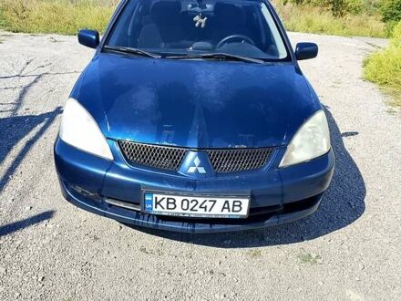 Синій Міцубісі Lancer, об'ємом двигуна 1.58 л та пробігом 317 тис. км за 3600 $, фото 1 на Automoto.ua