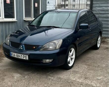 Синий Мицубиси Лансер, объемом двигателя 2 л и пробегом 222 тыс. км за 3999 $, фото 1 на Automoto.ua