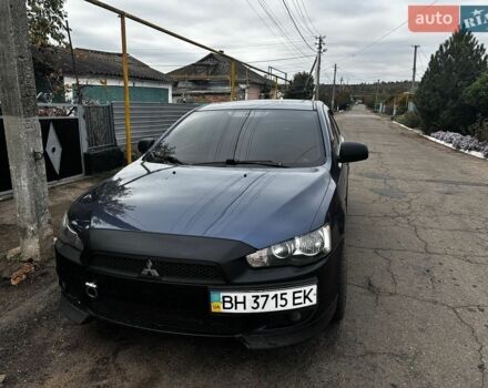 Синій Міцубісі Lancer, об'ємом двигуна 2 л та пробігом 250 тис. км за 5399 $, фото 1 на Automoto.ua