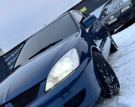 Синій Міцубісі Lancer, об'ємом двигуна 1.6 л та пробігом 233 тис. км за 4150 $, фото 1 на Automoto.ua