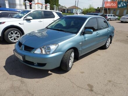 Синій Міцубісі Lancer, об'ємом двигуна 1.6 л та пробігом 187 тис. км за 5000 $, фото 1 на Automoto.ua