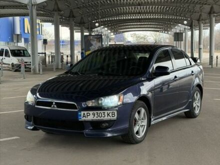 Синій Міцубісі Lancer, об'ємом двигуна 2 л та пробігом 255 тис. км за 5999 $, фото 1 на Automoto.ua