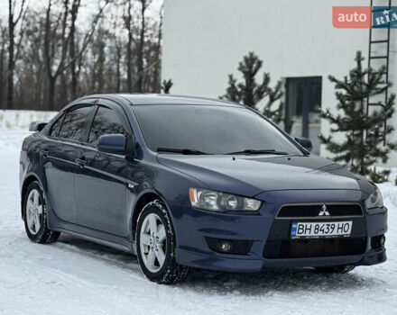 Синій Міцубісі Lancer, об'ємом двигуна 2 л та пробігом 220 тис. км за 7000 $, фото 1 на Automoto.ua
