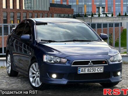 Синій Міцубісі Lancer, об'ємом двигуна 2 л та пробігом 230 тис. км за 7799 $, фото 1 на Automoto.ua