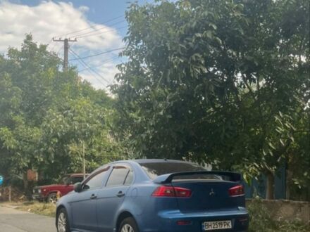 Синій Міцубісі Lancer, об'ємом двигуна 2 л та пробігом 190 тис. км за 6000 $, фото 1 на Automoto.ua