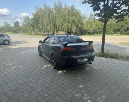 Синий Мицубиси Лансер, объемом двигателя 2 л и пробегом 220 тыс. км за 3999 $, фото 1 на Automoto.ua