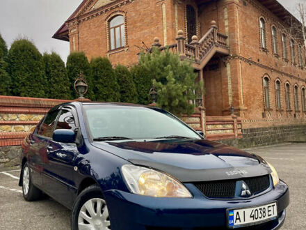 Синій Міцубісі Lancer, об'ємом двигуна 1.6 л та пробігом 184 тис. км за 4950 $, фото 1 на Automoto.ua