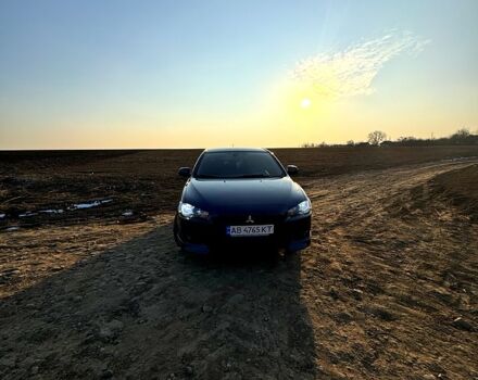 Синий Мицубиси Лансер, объемом двигателя 2 л и пробегом 176 тыс. км за 6400 $, фото 1 на Automoto.ua