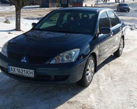 Синий Мицубиси Лансер, объемом двигателя 1.6 л и пробегом 186 тыс. км за 4500 $, фото 1 на Automoto.ua