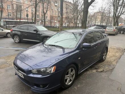 Синий Мицубиси Лансер, объемом двигателя 2 л и пробегом 200 тыс. км за 6700 $, фото 1 на Automoto.ua