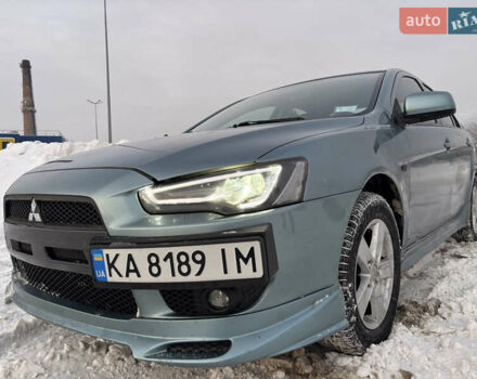 Синий Мицубиси Лансер, объемом двигателя 2 л и пробегом 189 тыс. км за 7650 $, фото 1 на Automoto.ua