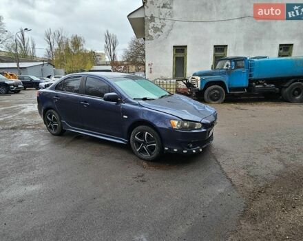 Синий Мицубиси Лансер, объемом двигателя 2 л и пробегом 140 тыс. км за 3200 $, фото 1 на Automoto.ua