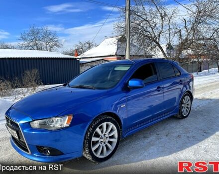 Синий Мицубиси Лансер, объемом двигателя 2 л и пробегом 21500 тыс. км за 11000 $, фото 1 на Automoto.ua