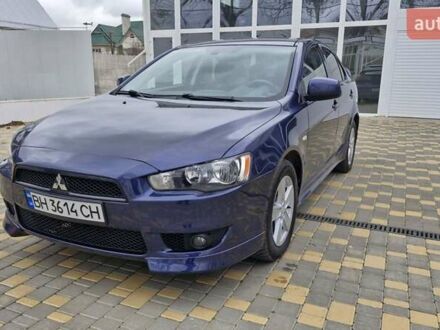 Синий Мицубиси Лансер, объемом двигателя 2 л и пробегом 186 тыс. км за 7200 $, фото 1 на Automoto.ua