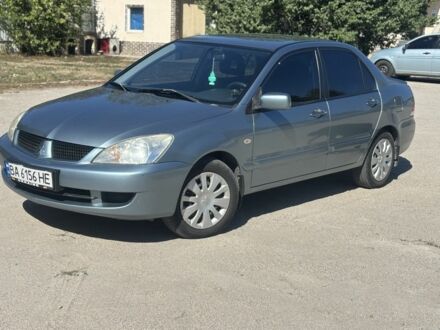 Мицубиси Лансер 2008 в Кропивницком (Кировограде) на Automoto.ua Синий Мицубиси Лансер, объемом двигателя 1.6 л и пробегом 243 тыс. км за 4400 $, фото 1 на Automoto.ua