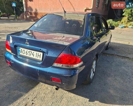 Синій Міцубісі Lancer, об'ємом двигуна 1.6 л та пробігом 195 тис. км за 4000 $, фото 1 на Automoto.ua