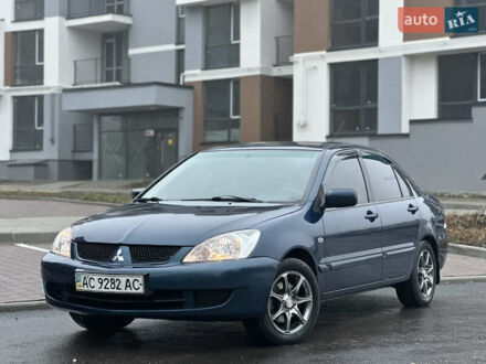 Синий Мицубиси Лансер, объемом двигателя 1.6 л и пробегом 187 тыс. км за 3799 $, фото 1 на Automoto.ua