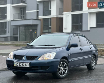 Синий Мицубиси Лансер, объемом двигателя 1.6 л и пробегом 187 тыс. км за 3799 $, фото 1 на Automoto.ua