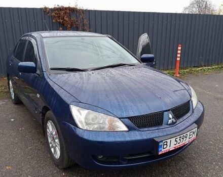 Синій Міцубісі Lancer, об'ємом двигуна 1.6 л та пробігом 206 тис. км за 5500 $, фото 1 на Automoto.ua