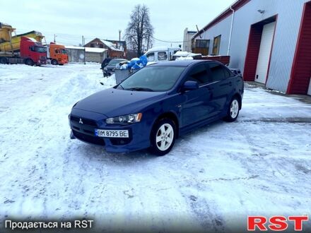 Синій Міцубісі Lancer, об'ємом двигуна 2 л та пробігом 195 тис. км за 6850 $, фото 1 на Automoto.ua