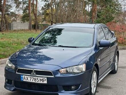 Синий Мицубиси Лансер, объемом двигателя 1.5 л и пробегом 220 тыс. км за 6999 $, фото 1 на Automoto.ua