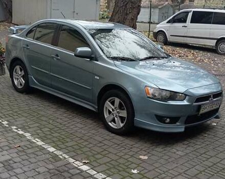 Синий Мицубиси Лансер, объемом двигателя 2 л и пробегом 300 тыс. км за 6900 $, фото 1 на Automoto.ua