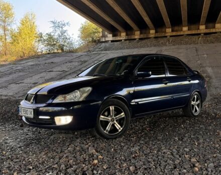 Синій Міцубісі Lancer, об'ємом двигуна 1.6 л та пробігом 320 тис. км за 4300 $, фото 1 на Automoto.ua